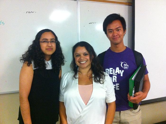 Gabriela Monsalve (center) stands with two of her audience members after her lecture. 