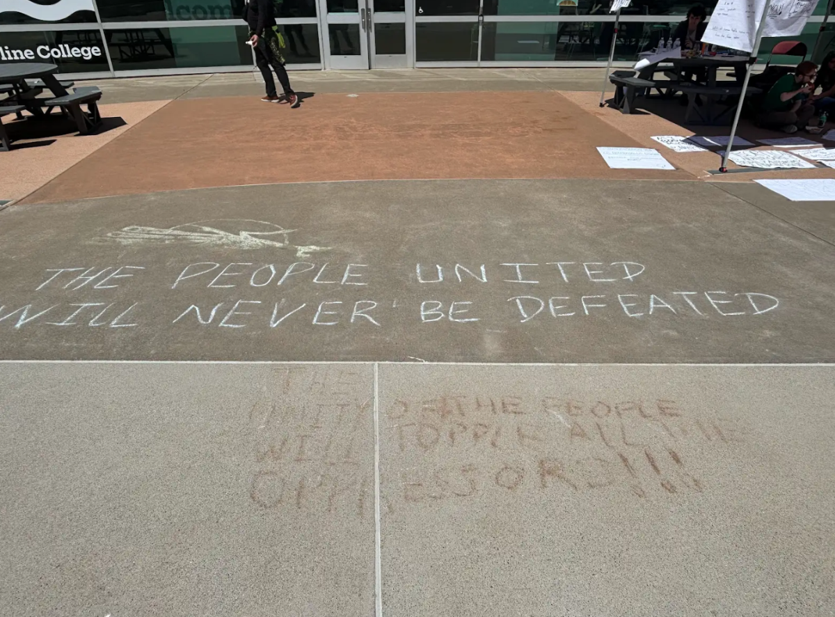 Chalk messaging seen near the site of the protests on Aug. 28.