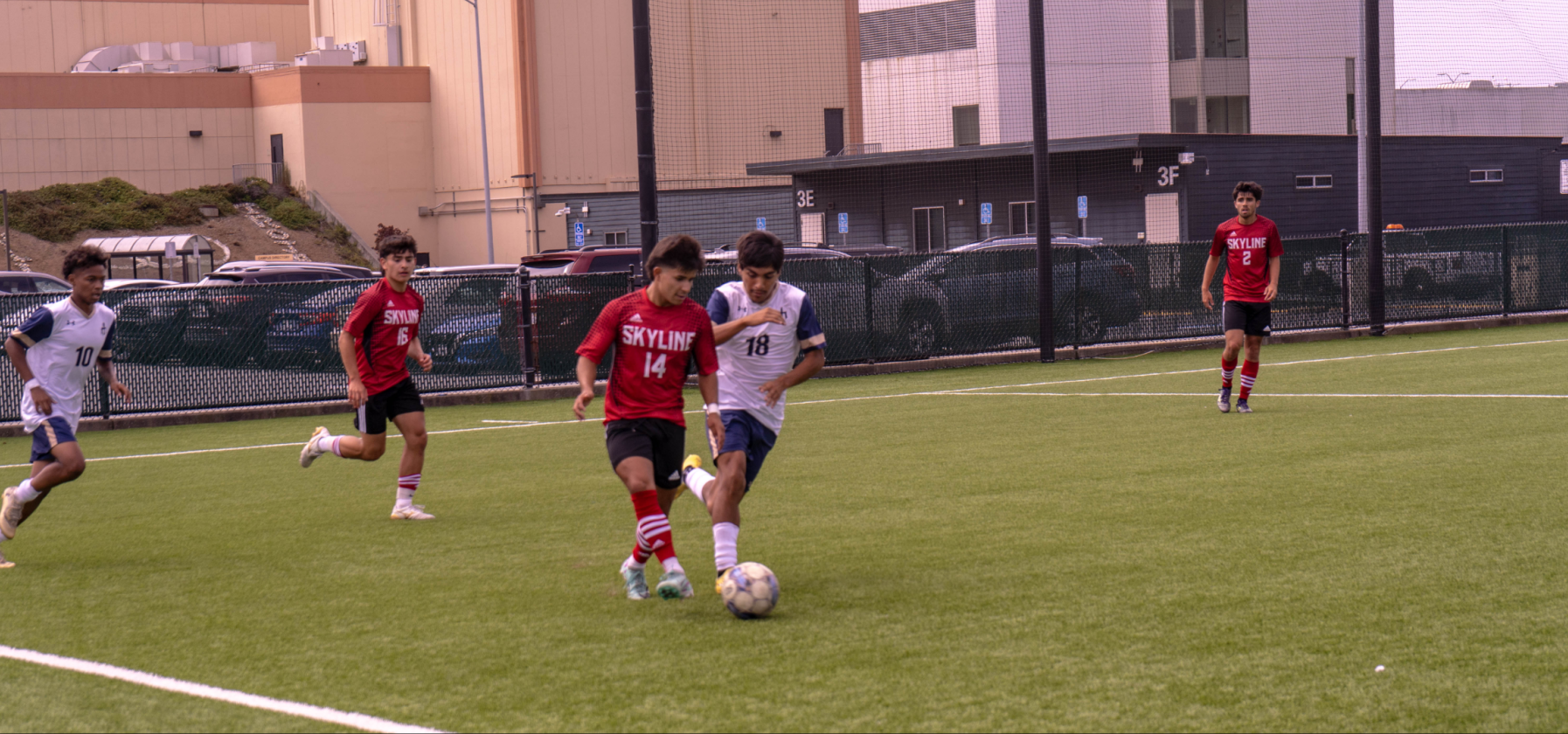 Brendan Pineda (Skyline #14) steals the ball from Raul Arzola (Merced #18)