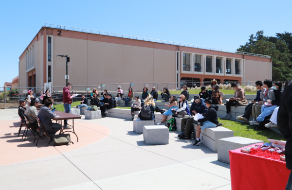 Students gather in the quad to listen to the teach-in.