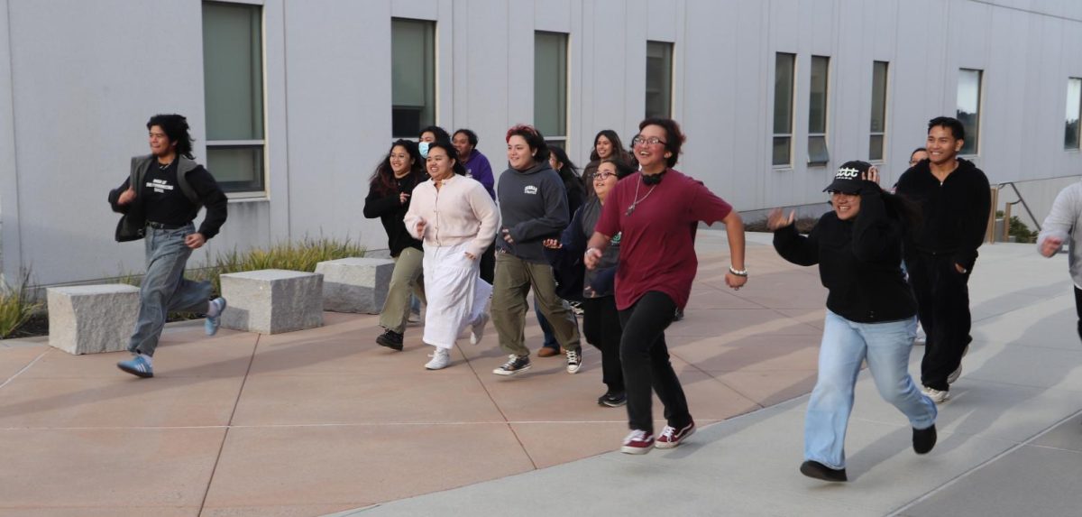 Members of Filipino Student Union play Takbo-takbuhan, a Filipino street game version of Red Light, Green Light from the series "Squid Game." 